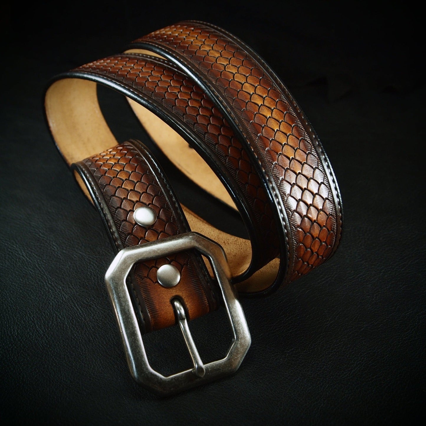 Hand tooled brown belt. Unique FM design