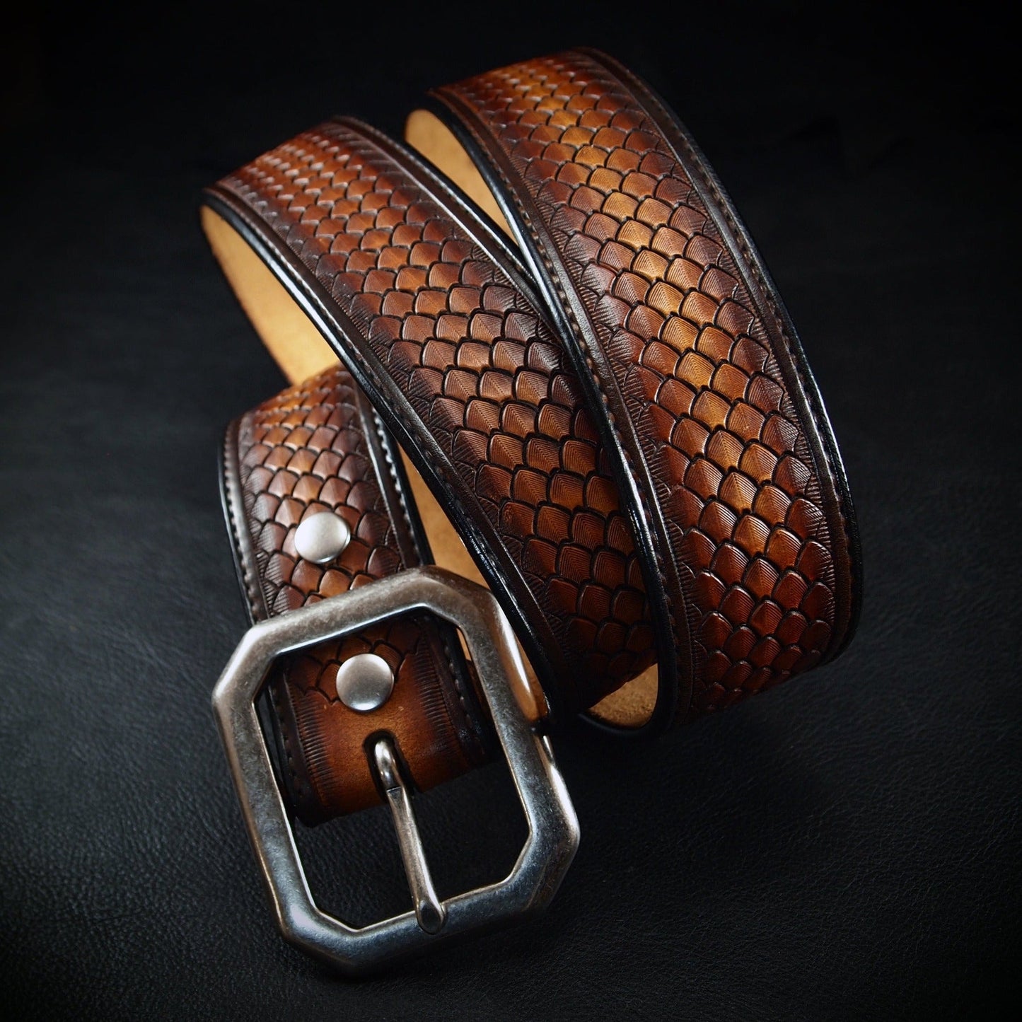 Hand tooled brown belt. Unique FM design
