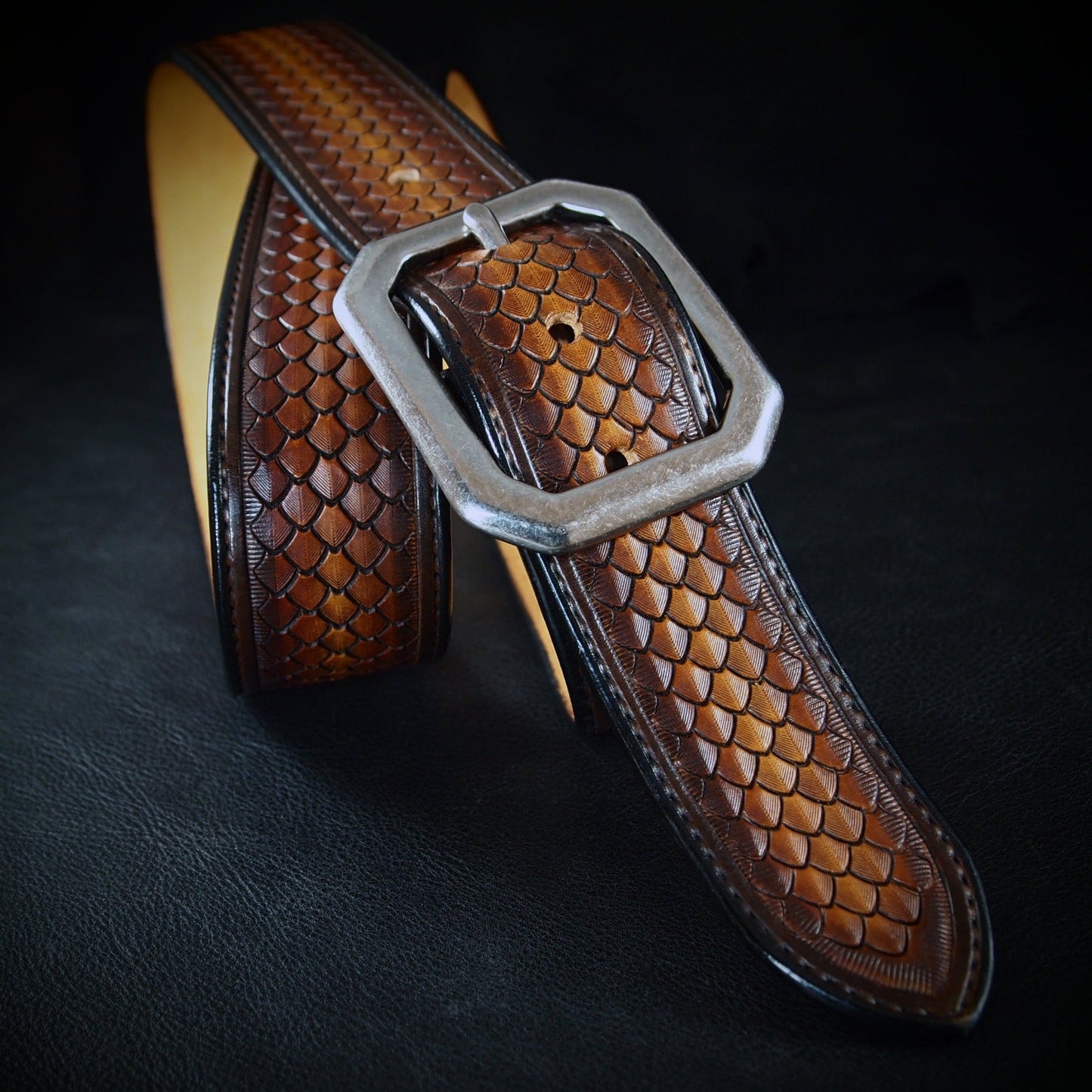 Hand tooled brown belt. Unique FM design