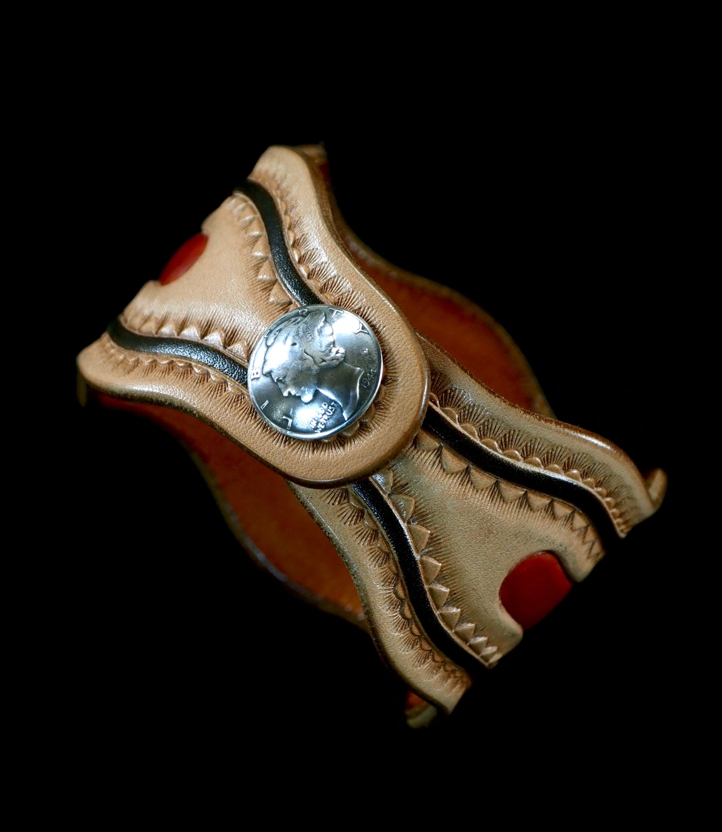Native design carved and stamped leather cuff