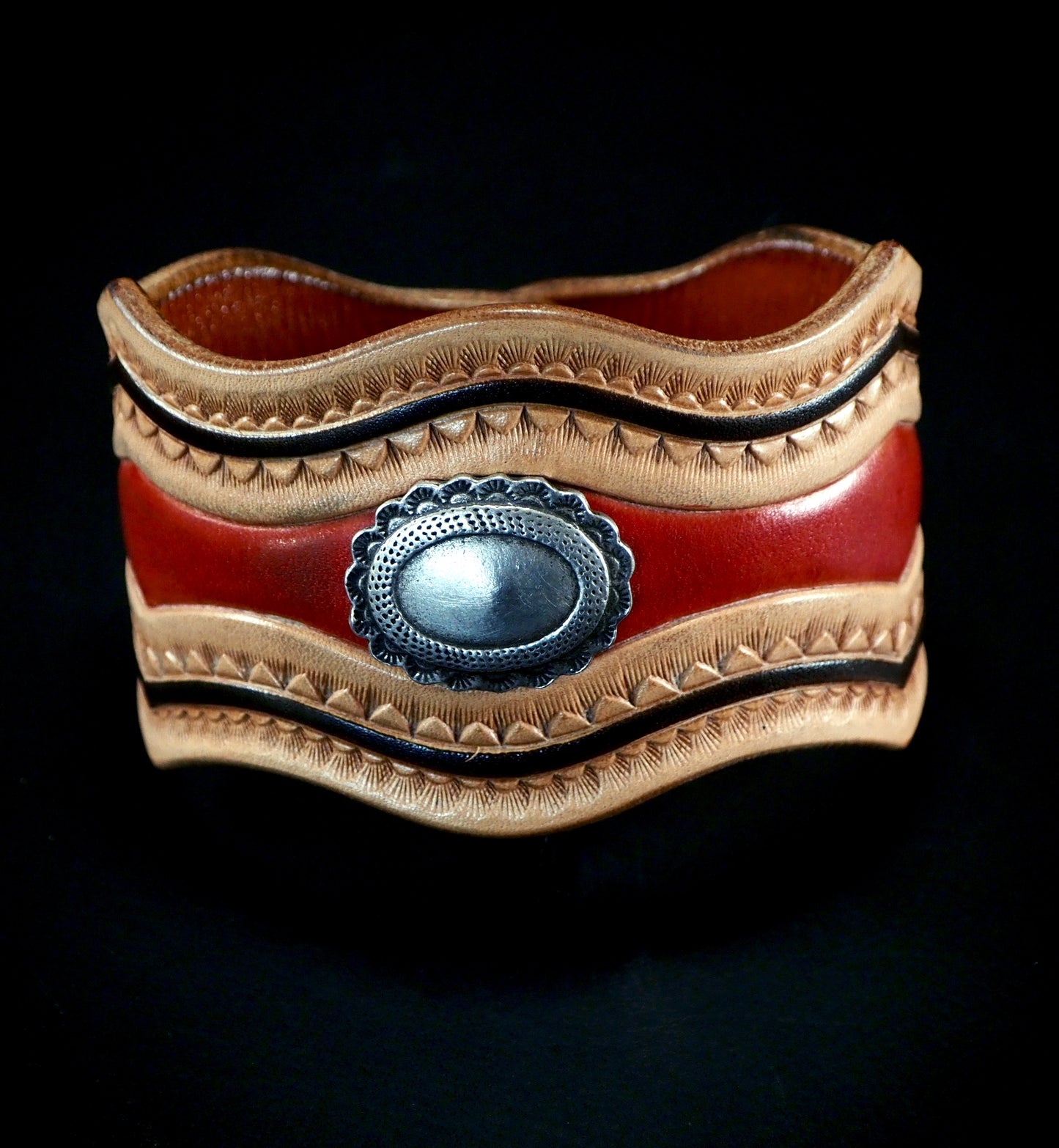 Native design carved and stamped leather cuff