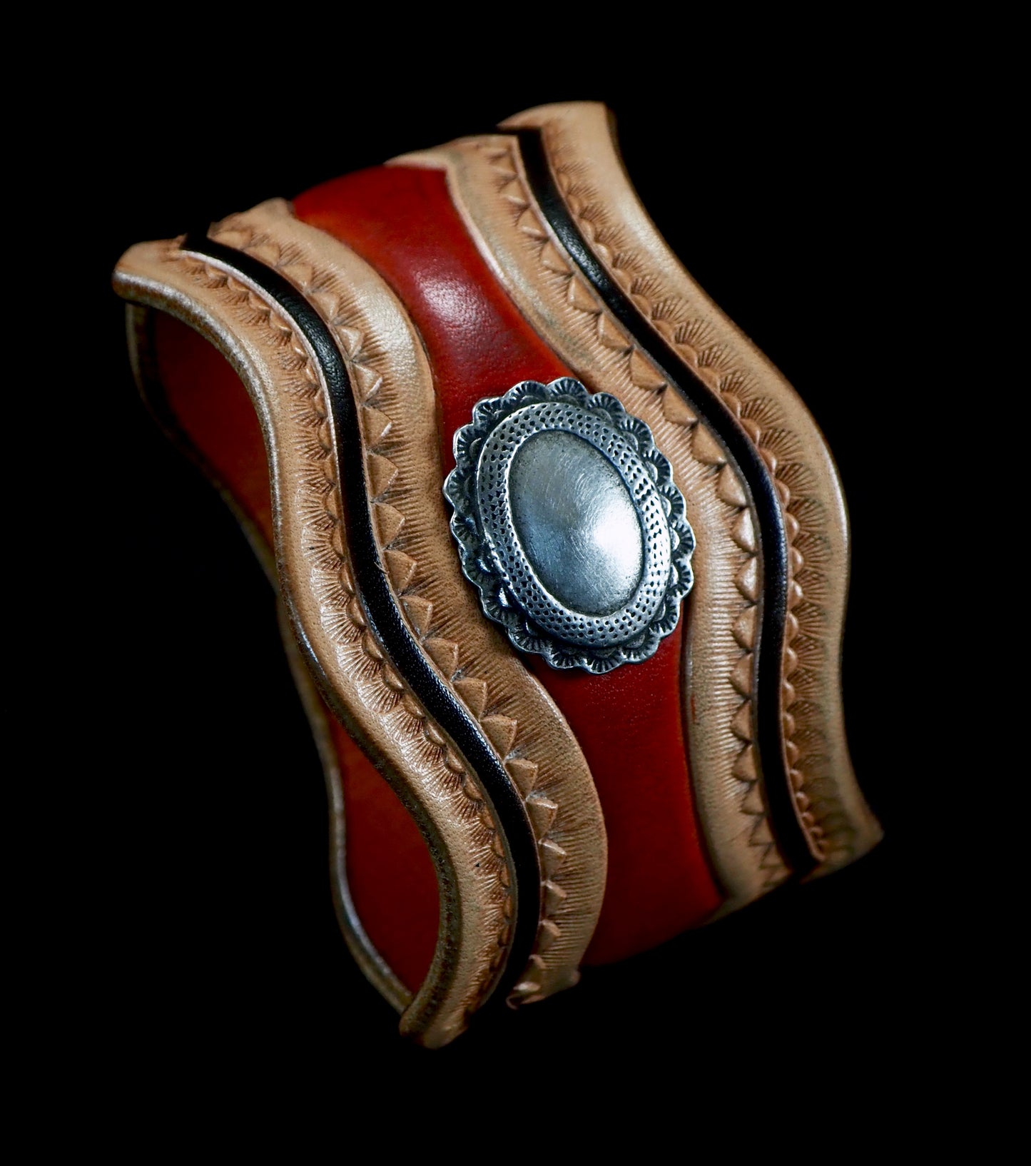 Native design carved and stamped leather cuff