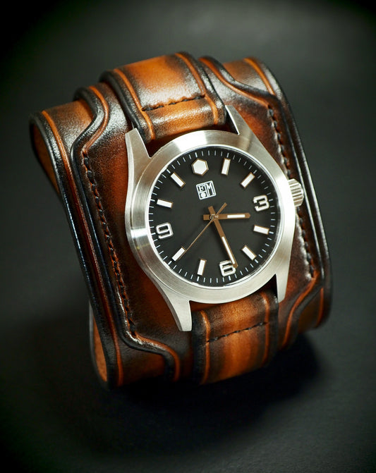 Leather cuff watch Sunburst Hex face : Rich layered leather watchband.