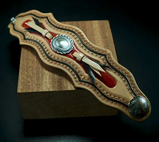 Native design carved laced and stamped leather cuff