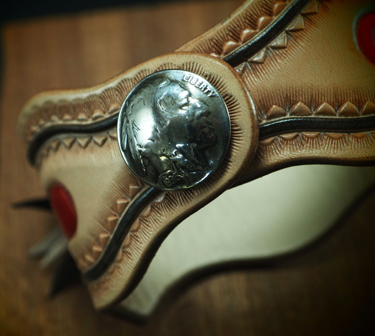 Native design carved laced and stamped leather cuff