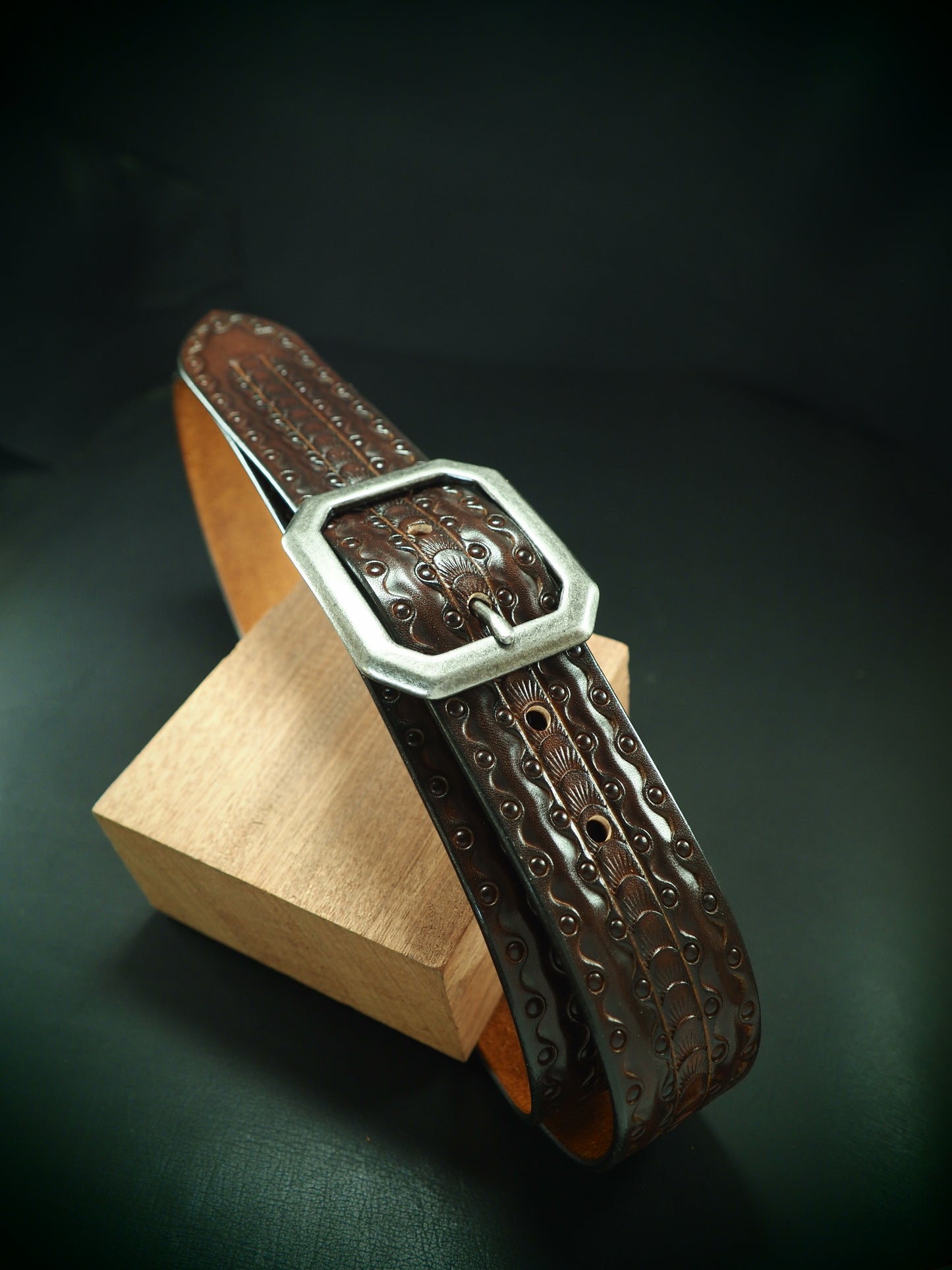 Hand tooled 1.5" rich walnut Fluid stamped belt. Unique FM design