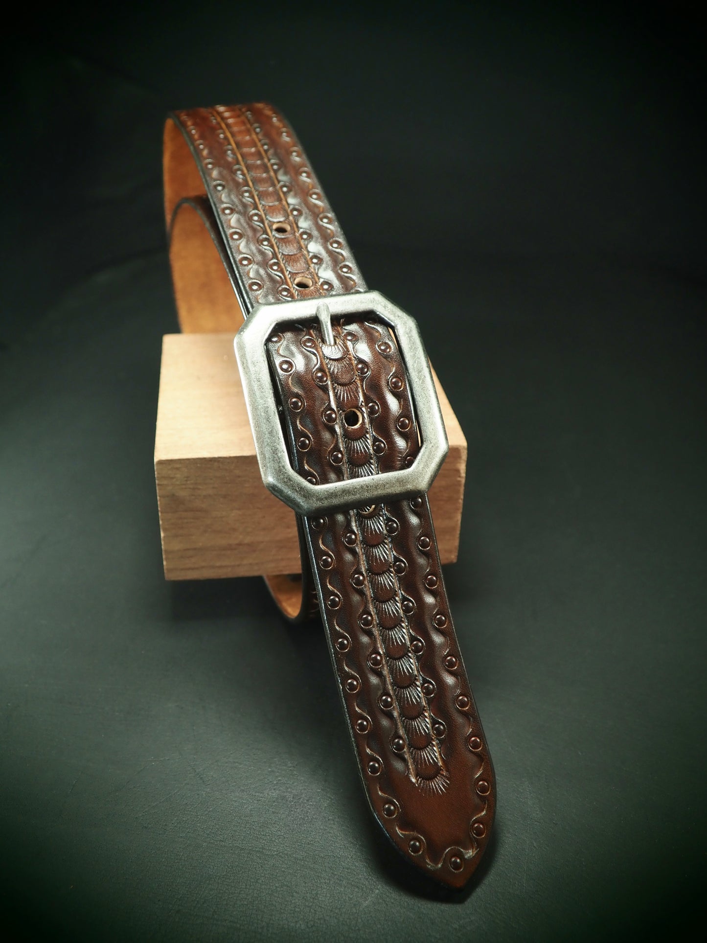Hand tooled 1.5" rich walnut Fluid stamped belt. Unique FM design