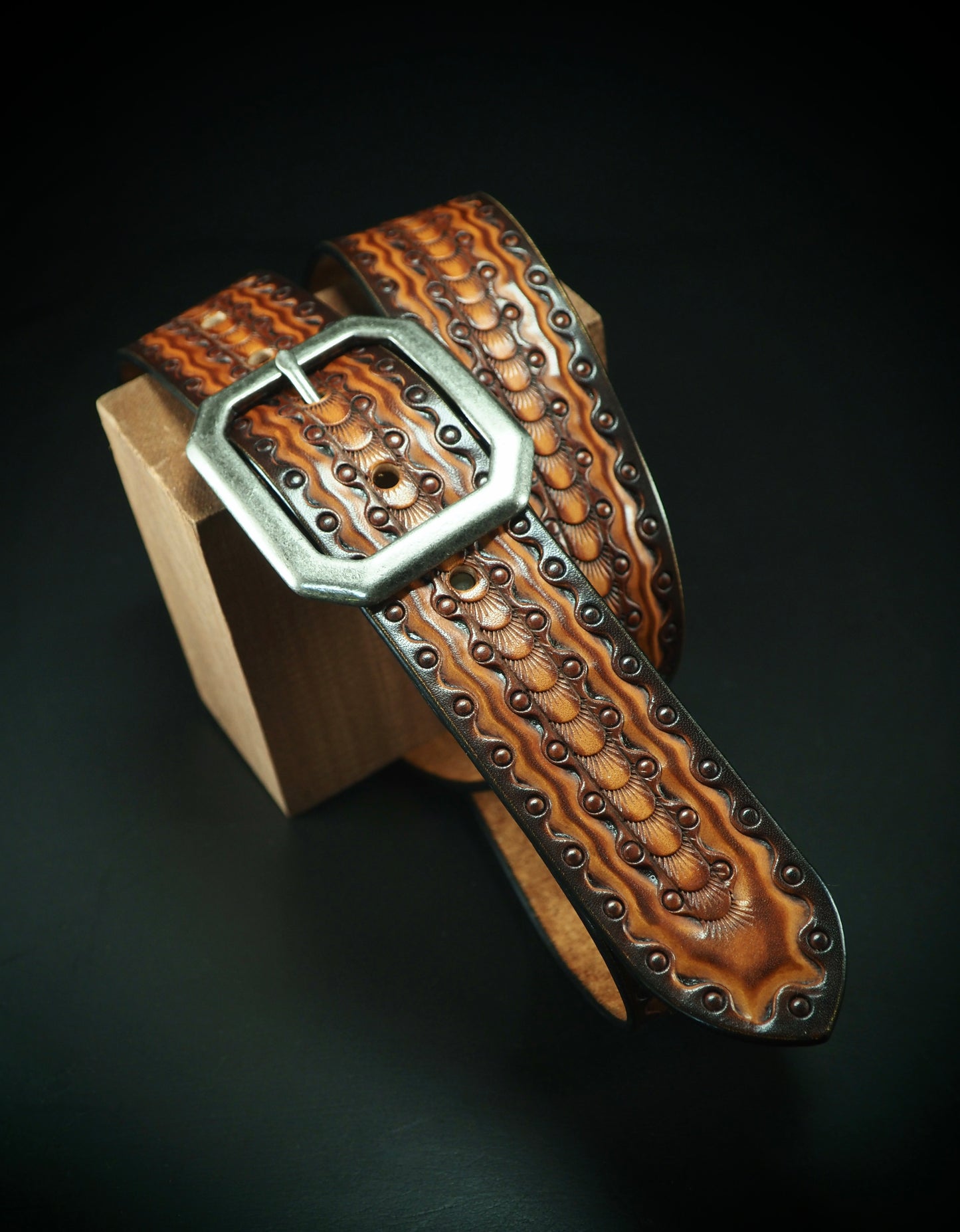 Hand tooled 1.5" rich Sunburst Fluid stamped belt. Unique FM design