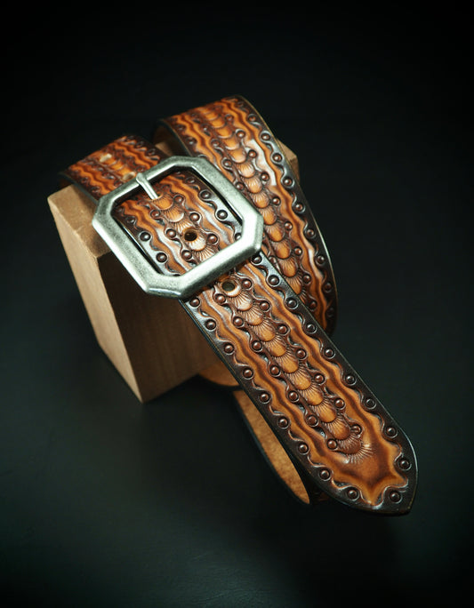 Hand tooled 1.5" rich Sunburst Fluid stamped belt. Unique FM design