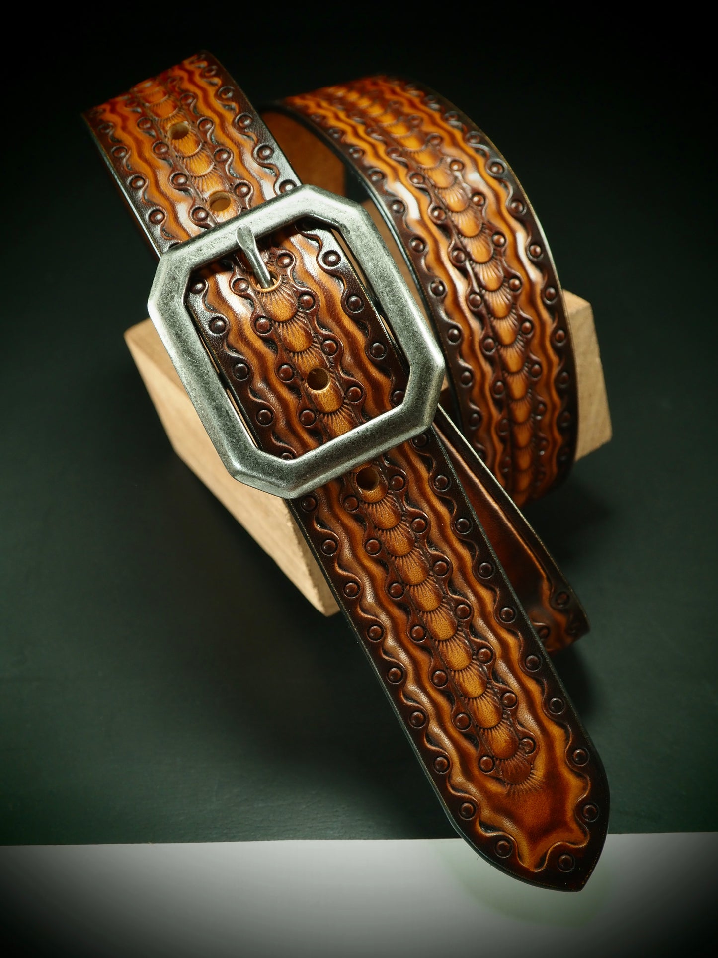 Hand tooled 1.5" rich Sunburst Fluid stamped belt. Unique FM design