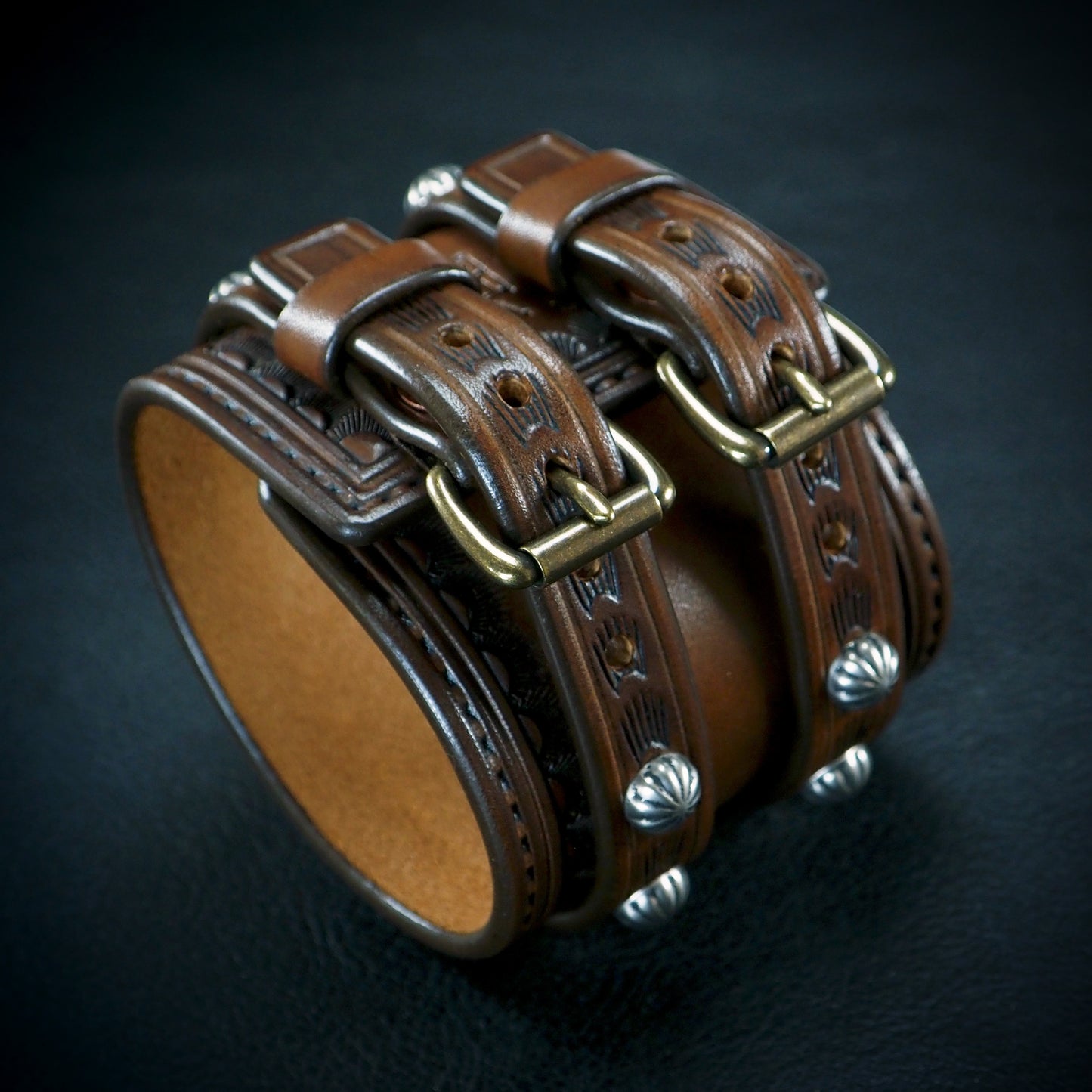 2.75" brown double strap tooled and stamped studded cuff